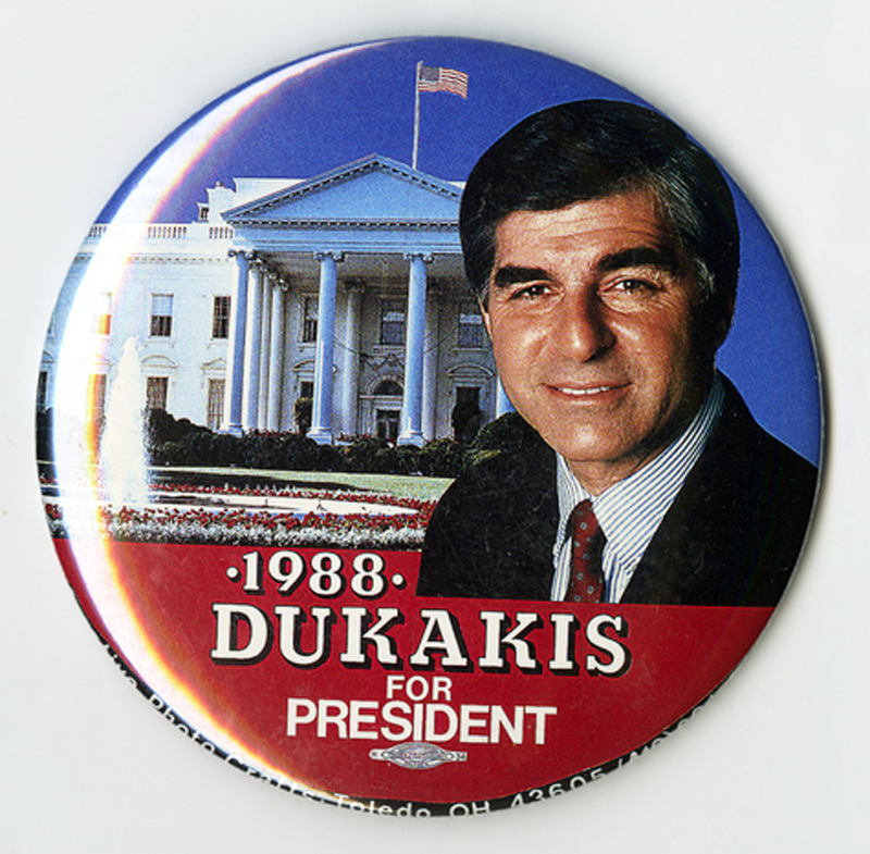 a button with a picture of a man and a white house